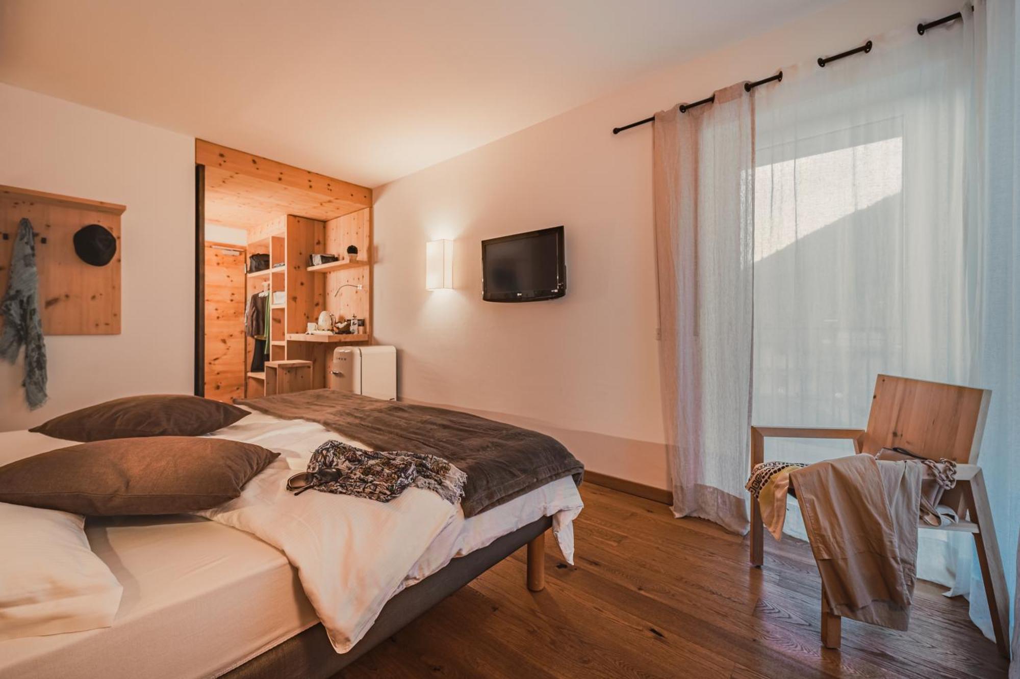 Cristallo Sport & Wellness Hotel Левико Терме Стая снимка